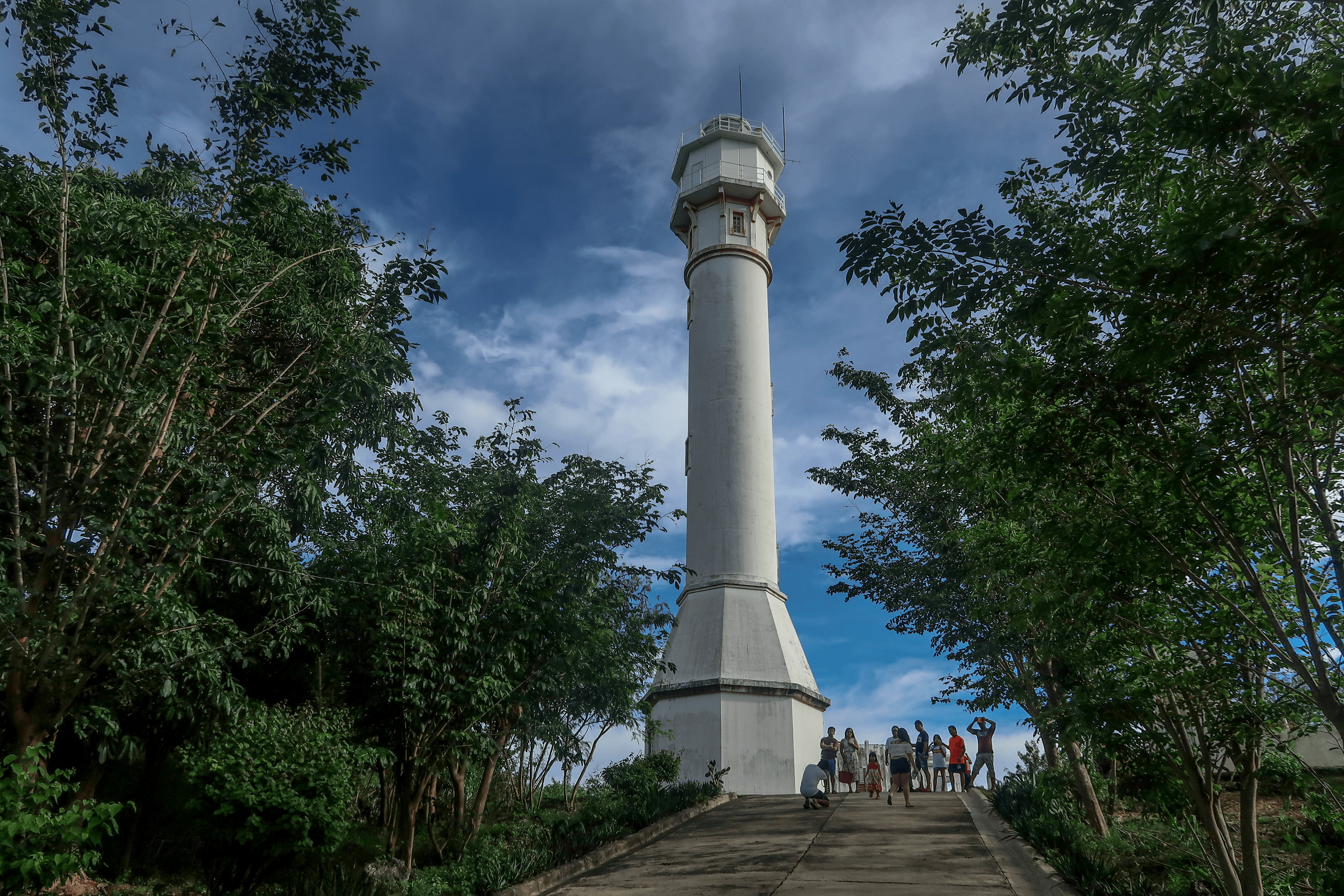 cape bolinao lighthouse in pangasinan province philippines with tourists